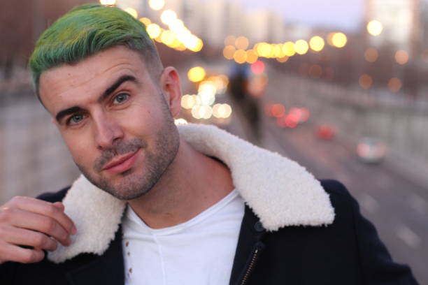 istock Trendsetter with green hair smiling 935612686