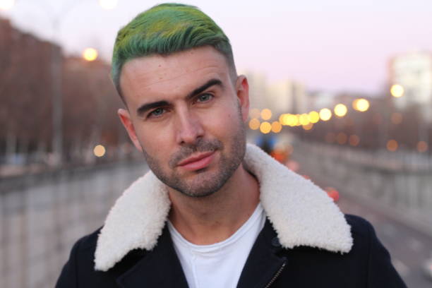 istock Trendsetter with green hair smiling 935612706