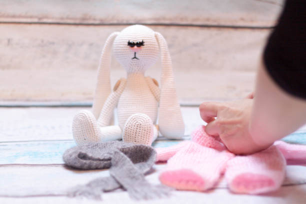 istock Knitted bunny and lamb toys 935614964