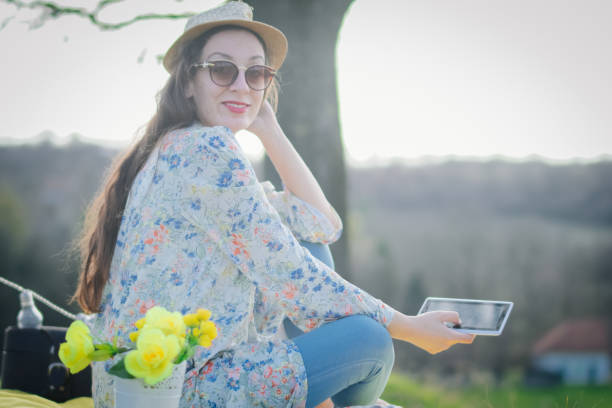 istock Relaxed woman among nature 935628390