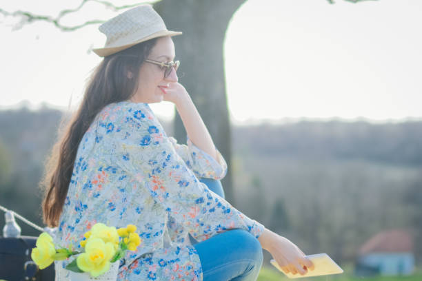 istock Relaxed woman among nature 935628402