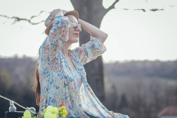 istock Relaxed woman among nature 935628618