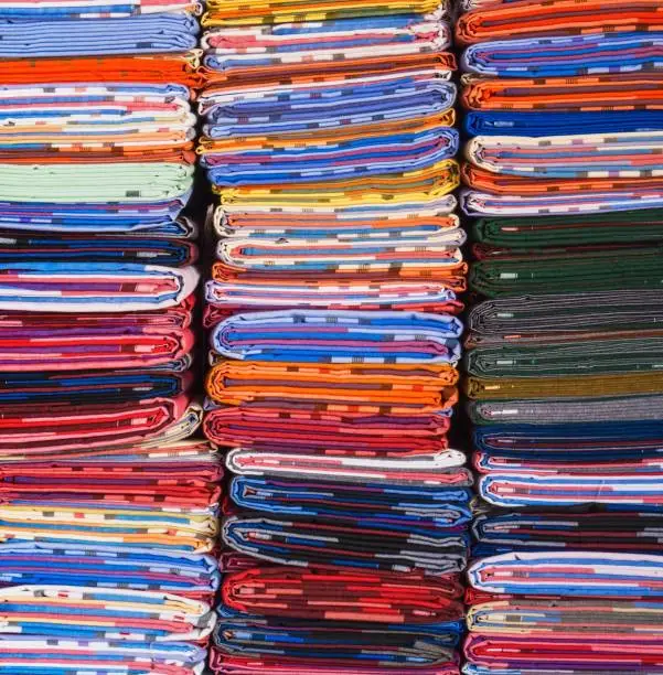 Photo of Stacks Of Indian Styled Fabrics