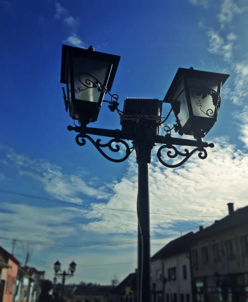 istock street lamp and market 935648892