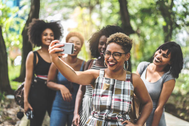 istock Multiracial group of friends taking selfie 935649248
