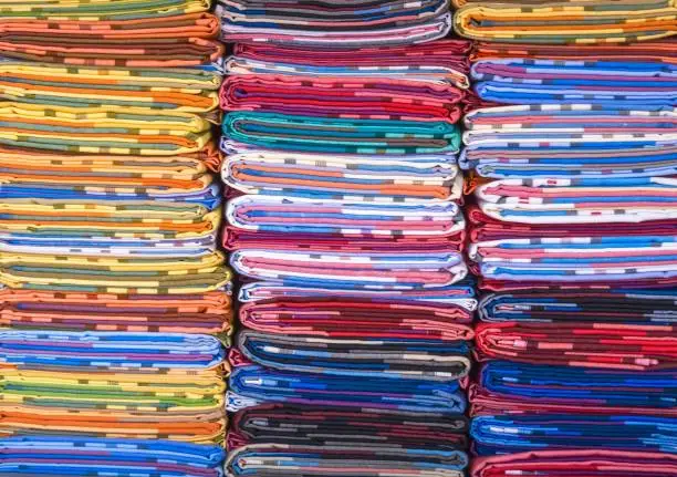 Photo of Stacks Of Indian Styled Fabrics