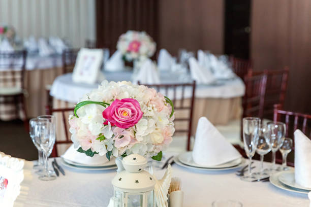 istock Table with glasses and napkins served for dinner in restaurant 935650304