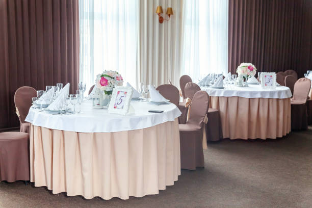 istock Table with glasses and napkins served for dinner in restaurant 935653512