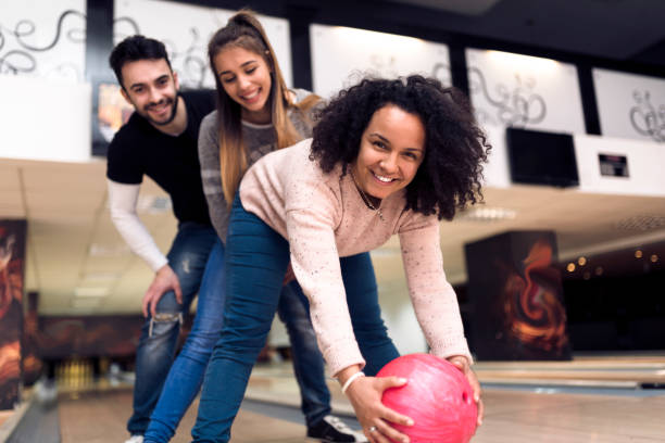 istock College students on a break at the bowling alley 935658528