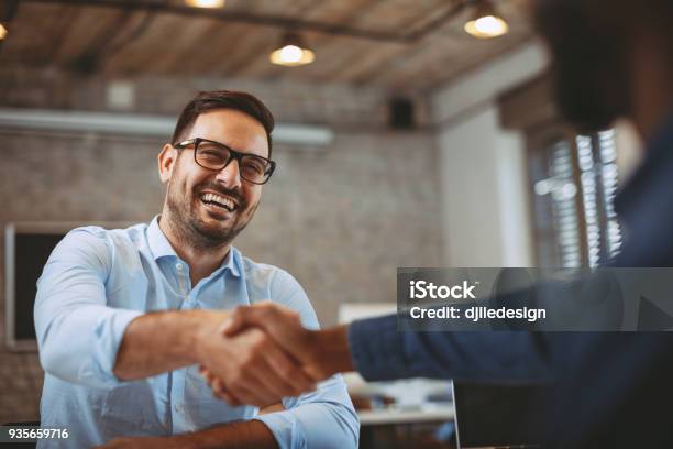 Close Up Of Handshake In The Office Stock Photo - Download Image Now - Handshake, Business, Partnership - Teamwork