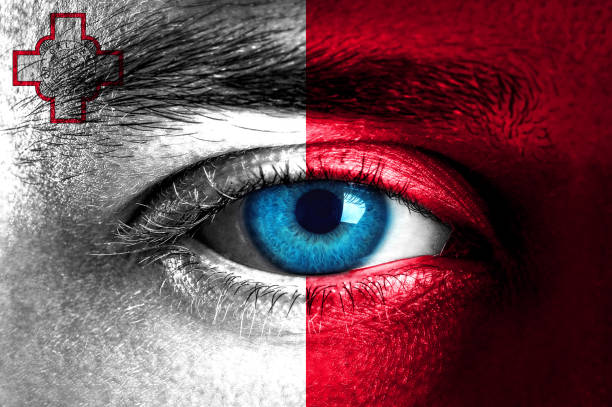 istock Human face painted with flag of Malta 935670846