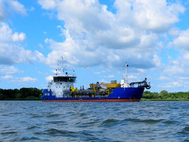 istock Hopper dredger ship is anchored in Danube river 935674354