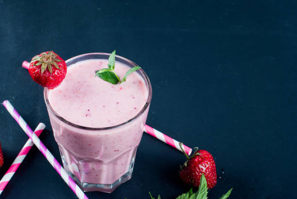 istock Refreshing strawberry and blueberry smoothies 935677952