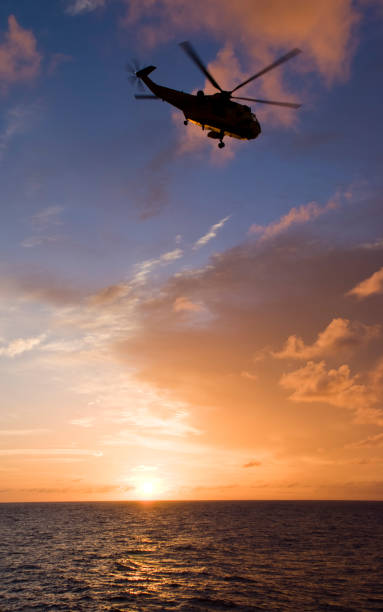 istock Silhouette of helicopter 935684330