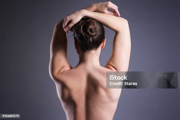 Slim Topless Woman On Gray Background Beauty Female Back Stock Photo - Download Image Now