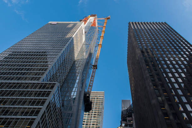 istock Crane at construction site at Midtown Manhattan. 935688066
