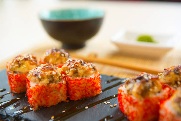 istock Hot Roll with Cream Cheese. Deep Fried Salmon outside. Salmon Fried Maki Sushi 935688478