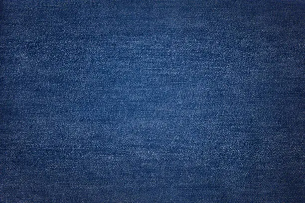 Blue jeans texture. Fabric background.