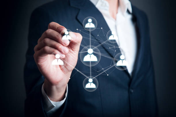 istock businessman hand pen with network in screen 935694920