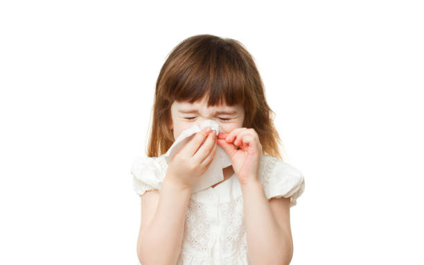 istock Girl 4-5 years snotting nose on white background 935698666