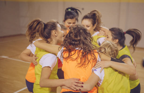 istock Volleyball team celebrating after winning. 935706074