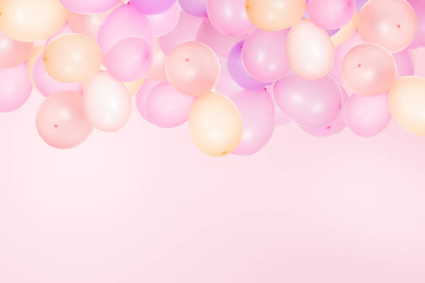 istock Beautiful young woman eating cupcake 935722508
