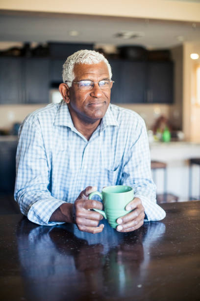 istock Senior Black Man Enjoying a Cup of Coffee at Home 935722984