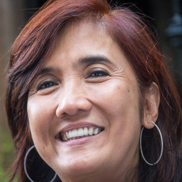 istock Smiling Asian Mature Woman 935723058