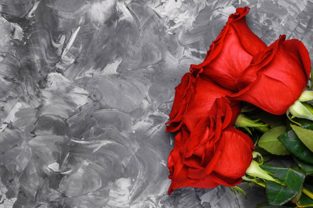 istock Red roses. Romantic background. Mother's, Valentines, Women's, Wedding Day. Top view with copy space. Place for text. Floral ornament, pattern, design, frame. 935725836