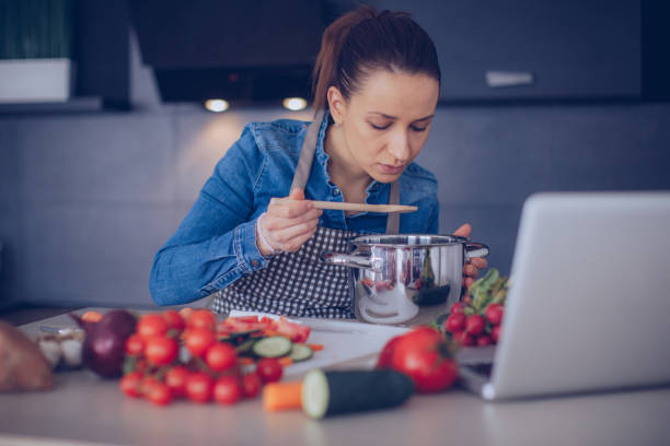 istock Modern woman preparing food 935729416