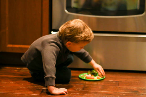 istock Candid Child Eating Healthy Snacks 935739646