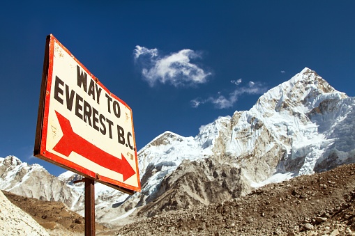Nuptse peak near Gorak Shep village and signpost - Way to Everest base camp - Khumbu valley, Solukhumbu,  Nepal Himalayas mountains