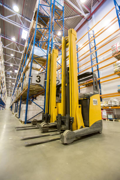 istock Powered industrial truck in warehouse 935767880