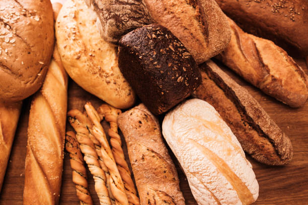 istock Fragrant bread on the table. Food concept 935771134