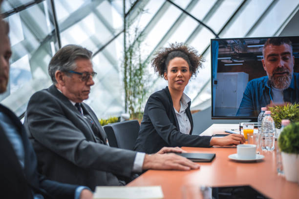 istock Business team having video call with their manager 935776974