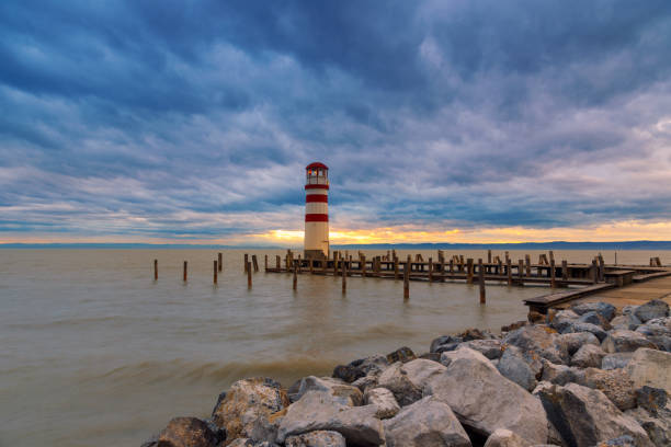istock Lighthouse at Lake Neusiedl at sunset 935779846