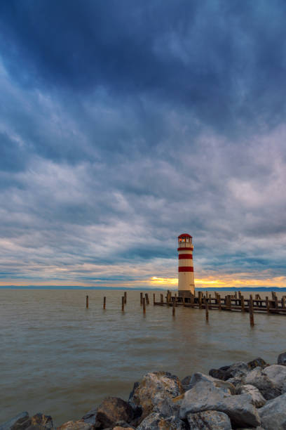 istock Lighthouse at Lake Neusiedl at sunset 935779858