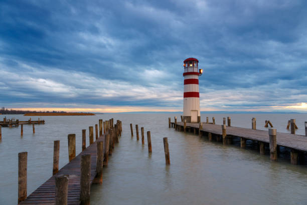 istock Lighthouse at Lake Neusiedl at sunset 935779888