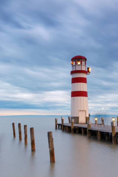 istock Lighthouse at Lake Neusiedl at sunset 935779924