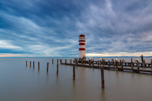 istock Lighthouse at Lake Neusiedl at sunset 935779966