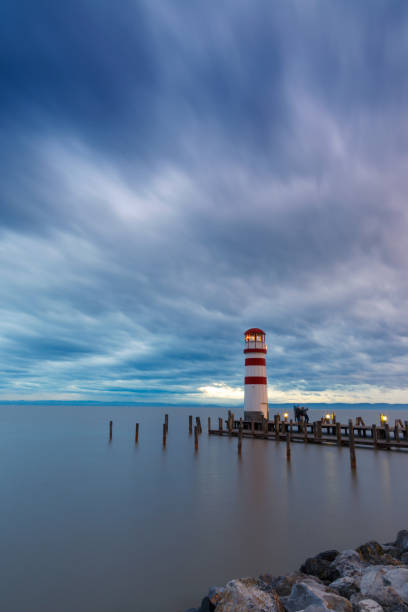 istock Lighthouse at Lake Neusiedl at sunset 935780002