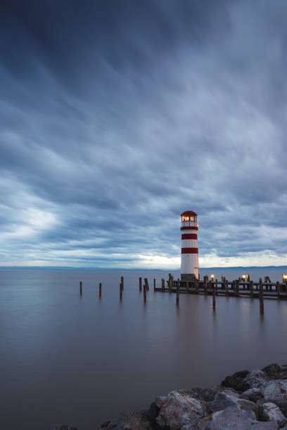 istock Lighthouse at Lake Neusiedl at sunset 935782042
