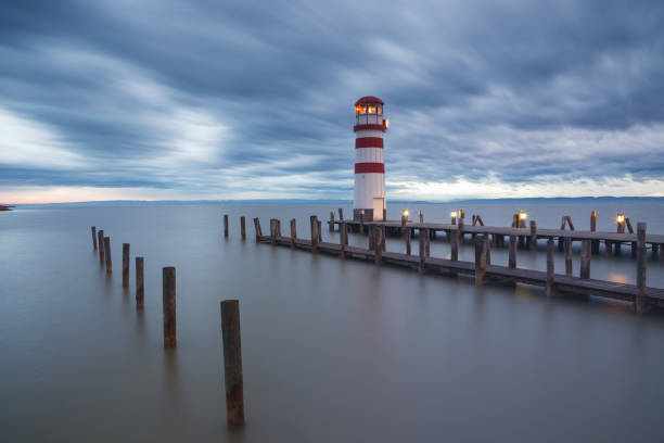 istock Lighthouse at Lake Neusiedl at sunset 935782052