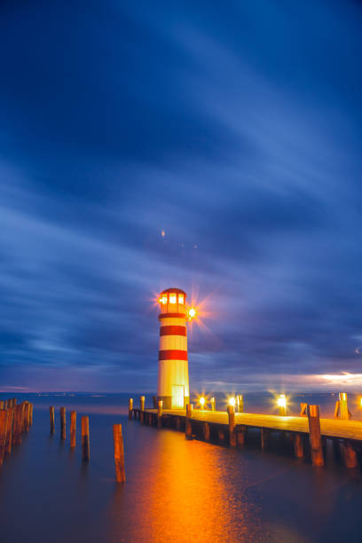 istock Lighthouse at Lake Neusiedl at sunset 935782300