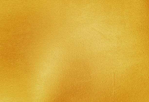 istock Shiny yellow leaf gold foil texture 935785044