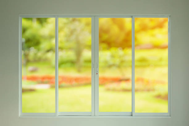 istock green garden view through the window 935802598
