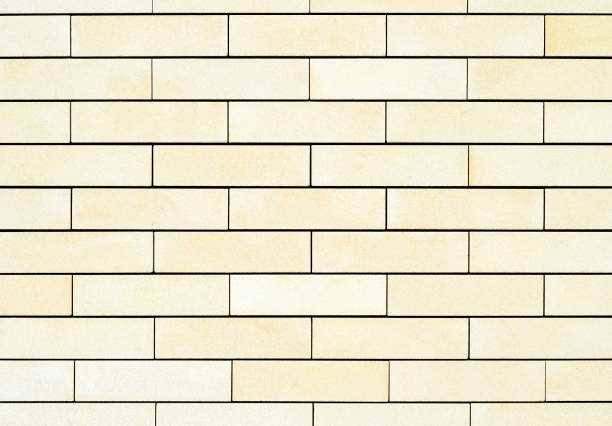 The average texture of the walls are light yellow bricks. Background.