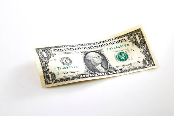 una bolletta da un dollaro isolata su sfondo bianco - currency us paper currency five dollar bill usa foto e immagini stock