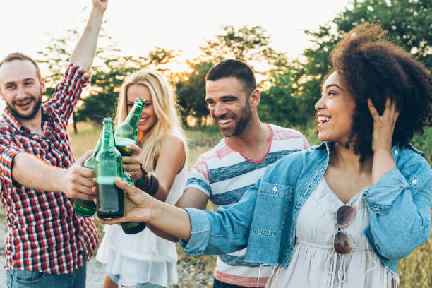istock Friends celebrating in nature 935812482