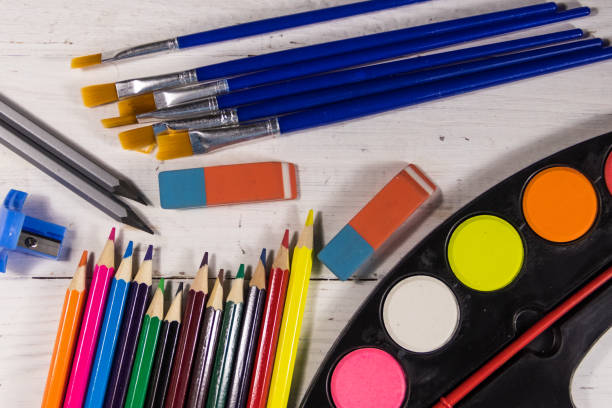 istock Set of drawing tools on white wooden background 935816162
